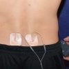 demonstrating Rhythm Touch replacement pad placement